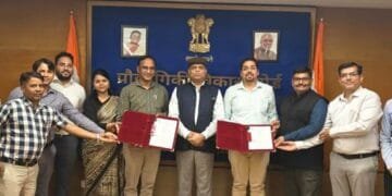 TDB-DST and Indigenous Energy officials with signed document supporting commercializing of batteries.