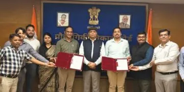 TDB-DST and Indigenous Energy officials with signed document supporting commercializing of batteries.